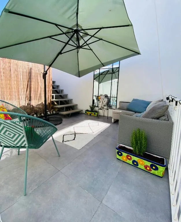 Terrace seating under a parasol